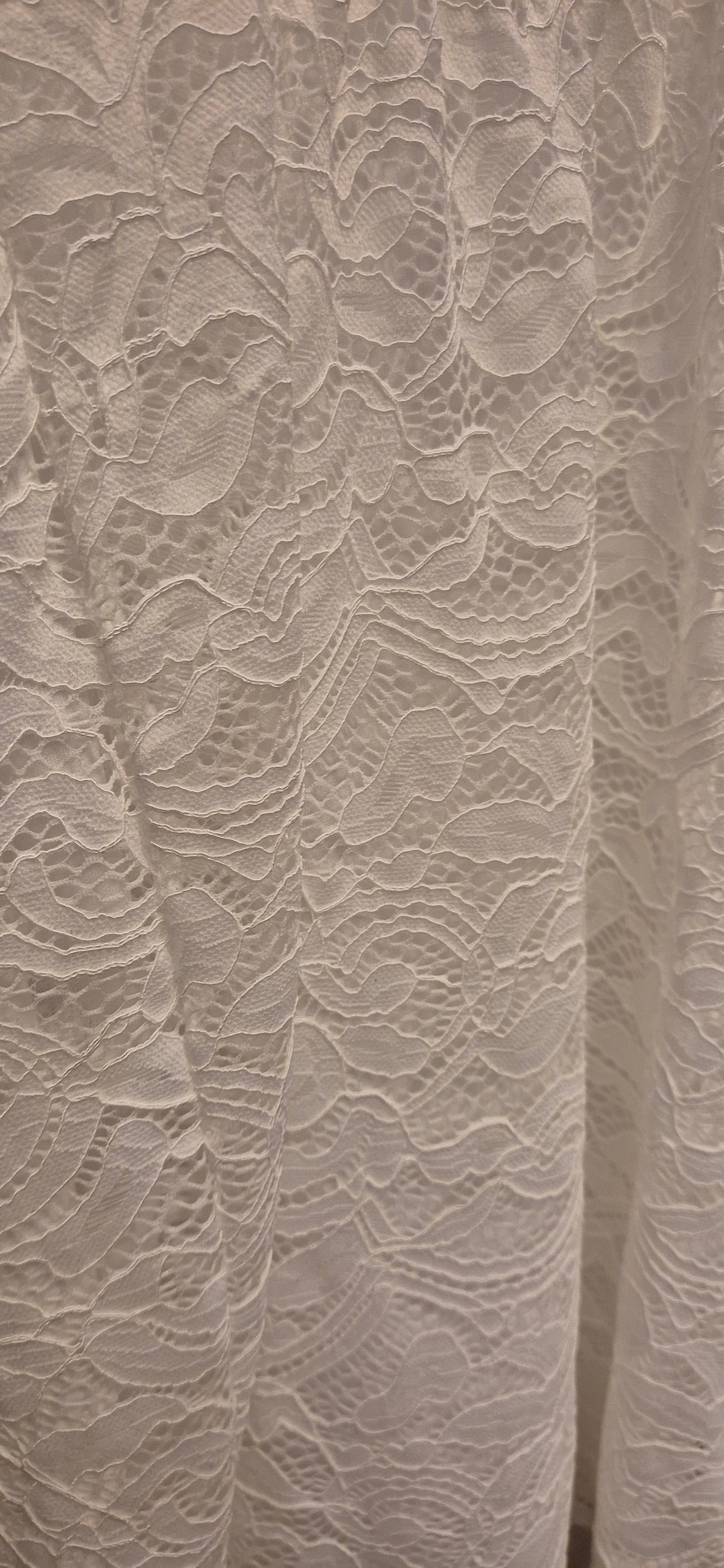 Minidress in pizzo Kostumn